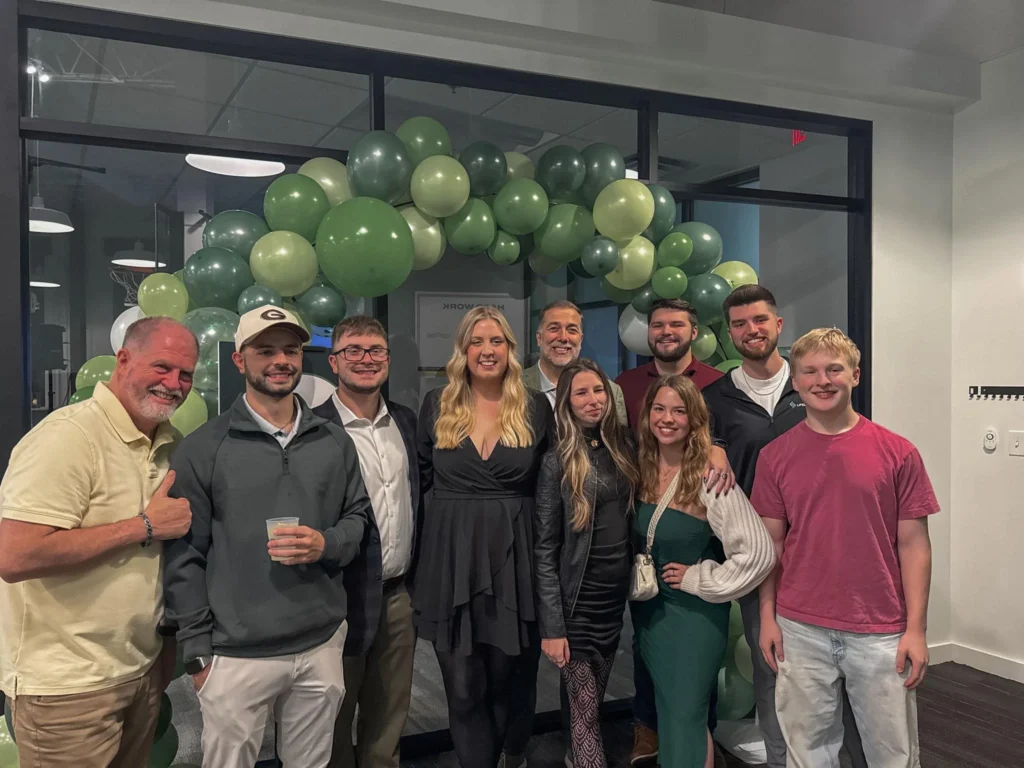 Lifelong Merchant Services team members celebrating together at company event